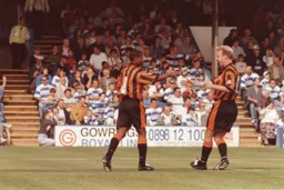 Gary Waddock congratulates Dwight Marshall on his goal