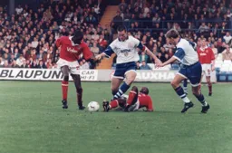 Steve Davis hurdles a Charlton defender
