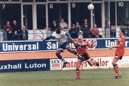 Marvin Johnson heads the ball towards the middle