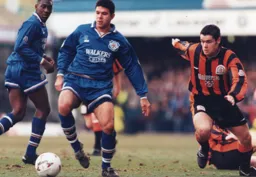 Richard Harvey attempting to cut out a back pass