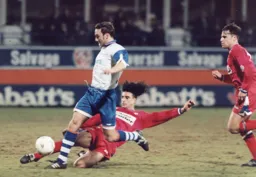 Scott Oakes is tackled by Andy Bernal