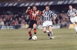 Tony Thorpe about win this midfield battle