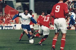 Graham Alexander tries to get through a packed Charlton rearguard
