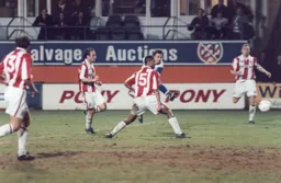 A surrounded Bontcho Guentchev has a go