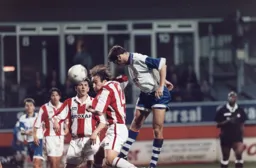 Scott Oakes sees a downward header saved by the goalkeeper