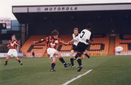 Graeme Tomlinson, on his full debut, fires in a shot