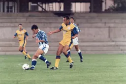 Des Linton forces the Rovers player away