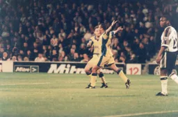 Kim Grant celebrates his goal that helped the Town pull off the cup shock
