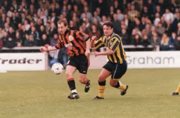 Paul Showler in action as the Town book their place in the FA Cup 2nd Round