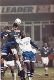 Spider and Stevo fighting at the back