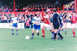 Skippy gets the better of a youthful but still dreadfully coiffured Robbie Savage