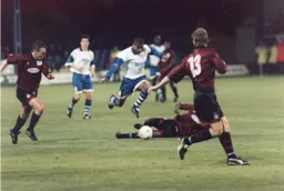 Dwight Marshall in full flight but promotion rivals and soon to be Champions Bury hold the Town to a goalless draw
