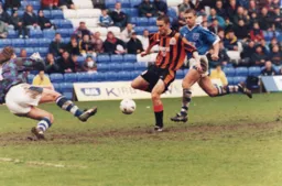 Andrew Fotiadis finishes his winner well in front of the huge Hatters following
