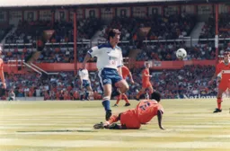 Paul McLaren evades a sliding tackle