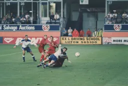 Tony Thorpe is wrestled to the ground