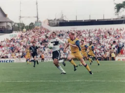 There is a look of determination on the face of David Oldfield in this race for the ball
