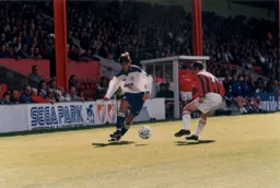 Paul McLaren takes on a Bournemouth defender