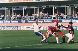 Phil Gray takes advantage of a mix up in the Wrexham defence