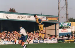 Phil Gray heads the ball forward
