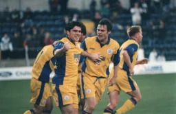 Tony Thorpe and Graham Alexander celebrate after Thorpe made the score 2-2