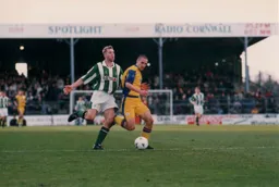 Andrew Fotiadis gets past Mick Heathcote