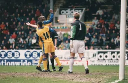 Mitchell Thomas looks happy after scoring Town`s equaliser