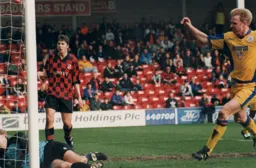 David Oldfield follows the ball into the net for the first goal