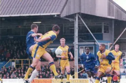 Steve Davis, up with the attack, attempts to find a yellow shirt with a knock down