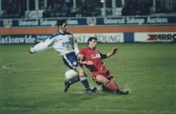 Mark Williams intervention nicks the ball away from Rory Allen