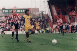 Stuart Douglas chases a through ball
