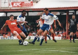 Stuart Douglas and Sean Evers competing for the ball