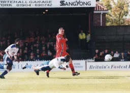 Mitchell Thomas with a low header