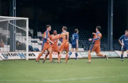 Andre Scarlett celebrates scoring on his debut