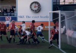 The ball crosses the line from a Sean Dyche header