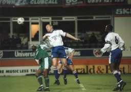 Sean Dyche heads away