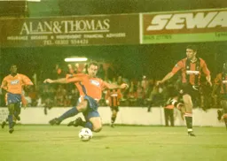 Phil Gray has an acrobatic attempt but to no avail