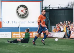 Andrew Fotiadis runs away after scoring the Town's only goal