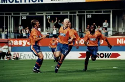 Stuart Fraser, complete with new hairstyle, scores his first Luton goal