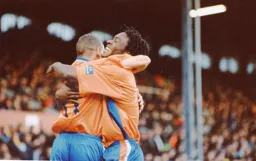 Stuart Douglas and Liam George celebrate the latters goal