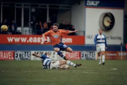 Adam Locke easily evades the sliding tackle
