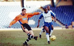 Alan White fires in an effort on the Shakers goal