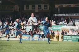 Phil Gray elegantly rises above the Wycombe defence