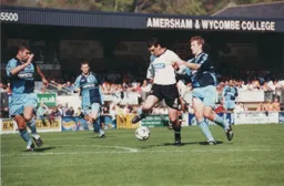 Matthew Spring comes out on top despite the attention of three Wycombe players