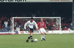 Matt Spring brings the ball forward