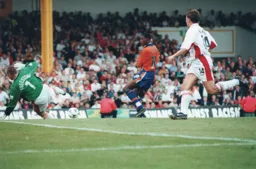 Roger Freestone blocks Tresor Kandol`s shot