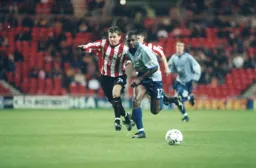 Emmerson Boyce bursts forward