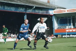 Mark Stein controls the ball with former Hatter loanee Sean Dyche in close attendance