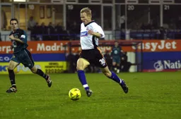 Petri Helin moves forward with the ball