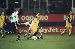 Petri Helin gets down on one knee to make a tackle