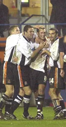 Paul McLaren celebrates scoring the second goal with Adrian Whitbread and Andrew Fotiadis